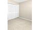 Bedroom with tile flooring and a closet at 12121 Wildbrook Dr, Riverview, FL 33569