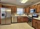 Well-lit kitchen featuring stainless steel appliances and bright countertop at 12121 Wildbrook Dr, Riverview, FL 33569