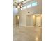 Open living space with high ceilings, large windows, and bright neutral colors at 12121 Wildbrook Dr, Riverview, FL 33569