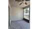 Enjoy the weather bug-free on this screened in lanai with a ceiling fan and view of the fenced backyard at 12121 Wildbrook Dr, Riverview, FL 33569