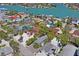 Waterfront neighborhood aerial view, showing roofs and nearby beach access at 13123 4Th E St, Madeira Beach, FL 33708