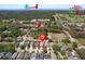 Aerial view of a neighborhood showing proximity to the Gulf, bike trails, and golf at 1666 Meadow Oak Ln, Tarpon Springs, FL 34689