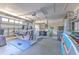 The garage has a work out station, appliances, and lots of storage space at 1666 Meadow Oak Ln, Tarpon Springs, FL 34689