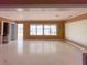Open-concept living room with waterfront views, perfect for entertaining and enjoying the serene surroundings at 179 Bath Club N Blvd, North Redington Beach, FL 33708