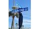 Street sign indicating 'Colony' and 'Bath Club Cir' with palm trees in the background at 179 Bath Club N Blvd, North Redington Beach, FL 33708
