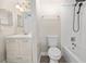 Bathroom showcasing modern fixtures, bright lighting and a shower-tub combo at 2017 Skimmer W Ct # 416, Clearwater, FL 33762