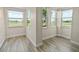 Bright living room featuring wood-look flooring and ample natural light with a view at 2017 Skimmer W Ct # 416, Clearwater, FL 33762