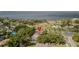 Aerial view of property with a pool and proximity to the bay at 301 1/2 Shore E Dr, Oldsmar, FL 34677