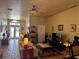 Spacious living area with tile floors and comfortable furnishings at 301 1/2 Shore E Dr, Oldsmar, FL 34677