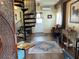 Cozy sitting room featuring a spiral staircase and stylish decor at 301 1/2 Shore E Dr, Oldsmar, FL 34677