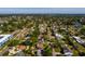 Aerial view shows the home located near the bay, restaurants and local businesses at 4126 Carson Ne St, St Petersburg, FL 33703