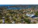 Aerial view shows the home located near the bay, restaurants and local businesses at 4126 Carson Ne St, St Petersburg, FL 33703