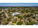 Aerial view of home in a community near a lake at 4126 Carson Ne St, St Petersburg, FL 33703