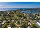Aerial view shows the home located near the bay, restaurants and local businesses at 4126 Carson Ne St, St Petersburg, FL 33703