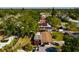 Aerial view of home in a wooded neighborhood at 4126 Carson Ne St, St Petersburg, FL 33703