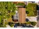 An aerial view shows the layout of the single story house, back deck and yard at 4126 Carson Ne St, St Petersburg, FL 33703