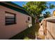 View of the side of the house and fence at 4126 Carson Ne St, St Petersburg, FL 33703