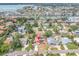 Aerial view of a waterfront home in a neighborhood with mature landscaping near Boca Ciega Bay at 4395 50Th S Ter, St Petersburg, FL 33711