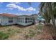 The backyard includes a patio and a view of the house at 4395 50Th S Ter, St Petersburg, FL 33711