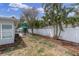 Large backyard featuring a patio set and space for landscaping and recreation at 4395 50Th S Ter, St Petersburg, FL 33711