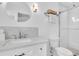 Modern bathroom features a walk-in glass shower, neutral color paint, and a quartz countertop vanity at 4395 50Th S Ter, St Petersburg, FL 33711