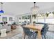 Bright dining area with a view of the backyard, a dining table, and modern decor at 4395 50Th S Ter, St Petersburg, FL 33711