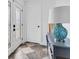 Inviting entryway with a patterned tile floor, elegant door, and decorative lamp at 4395 50Th S Ter, St Petersburg, FL 33711