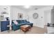 Cozy living room with modern decor, comfortable seating, and plenty of natural light at 4395 50Th S Ter, St Petersburg, FL 33711