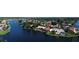 Waterfront property with pool, boat dock, and beautiful landscaping, as seen from above at 4804 Longwater Way, Tampa, FL 33615