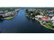 Aerial view of waterfront property with private pool and dock at 4804 Longwater Way, Tampa, FL 33615