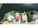 Aerial view showcasing waterfront homes, private docks, and inviting swimming pools at 4804 Longwater Way, Tampa, FL 33615