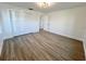 Bedroom with spacious closet, tile floors, and natural light at 4804 Longwater Way, Tampa, FL 33615
