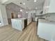 Spacious kitchen with marble countertops, modern appliances, and an oversized island at 4804 Longwater Way, Tampa, FL 33615