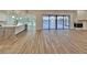 Spacious open layout featuring stylish flooring, recessed lighting, gourmet kitchen, and water views at 4804 Longwater Way, Tampa, FL 33615