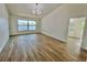 Living room with tile floors, water views, and modern lighting at 4804 Longwater Way, Tampa, FL 33615