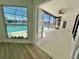 Enclosed lanai overlooking the pool and waterfront offers a relaxing outdoor living space at 4804 Longwater Way, Tampa, FL 33615