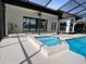 Beautiful backyard showcasing a pool and integrated spa, offering a perfect space for relaxation and outdoor entertainment at 4804 Longwater Way, Tampa, FL 33615
