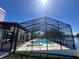 A screened pool and spa create an amazing space right off the back of this waterfront home at 4804 Longwater Way, Tampa, FL 33615