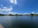 A waterfront view showcasing the surrounding neighborhood at 4804 Longwater Way, Tampa, FL 33615
