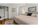 Comfortable bedroom featuring hardwood floors, closet, and neutral decor at 522 James St, Dunedin, FL 34698