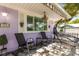 Inviting front porch with cozy seating and decorative details at 522 James St, Dunedin, FL 34698