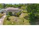 Aerial view of the backyard featuring large trees, and a relaxing hammock at 5995 59Th N Way, St Petersburg, FL 33709