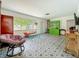 Cozy living room with a large picture window providing ample natural light at 5995 59Th N Way, St Petersburg, FL 33709