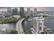 Stunning aerial view of waterfront condos with private docks and cityscape backdrop at 600 Garrison Cove Ln # 2B, Tampa, FL 33602