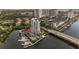 Beautiful condo complex with marina access and pool, set against a city backdrop at 600 Garrison Cove Ln # 2B, Tampa, FL 33602