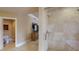 Bathroom featuring a glass shower and access to another bedroom area at 600 Garrison Cove Ln # 2B, Tampa, FL 33602