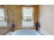 Elegant bathroom featuring a soaking tub, a window, and a separate shower at 600 Garrison Cove Ln # 2B, Tampa, FL 33602