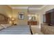 Bedroom with TV featuring an ensuite bathroom with a large vanity and mirror at 600 Garrison Cove Ln # 2B, Tampa, FL 33602