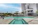 Enjoy the pool and spa, with waterfront views, and a nearby condominium building and boat docks at 600 Garrison Cove Ln # 2B, Tampa, FL 33602