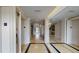 Elevator lobby with elegant flooring, large mirrors, and classic design at 600 Garrison Cove Ln # 2B, Tampa, FL 33602